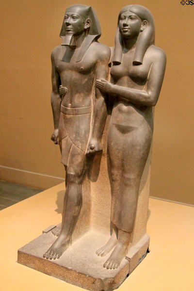 Ancient Egyptian pair statue of King Mycerinus & Queen Kha-merer-nebty II (2548-2530 BCE) at Museum of Fine Arts. Boston, MA.