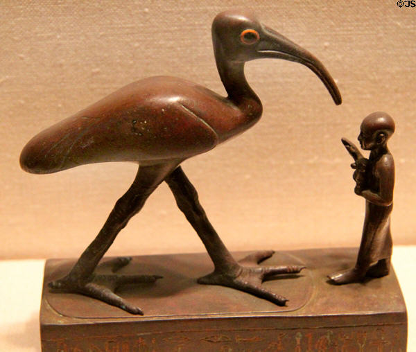 Ancient Egyptian bronze statuette of Ibis & priest (664-30 BCE) at Museum of Fine Arts. Boston, MA.