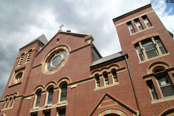 Romanesque Revival facade of Saint Leonard of Port Maurice Catholic Church (1885-99). Boston, MA.
