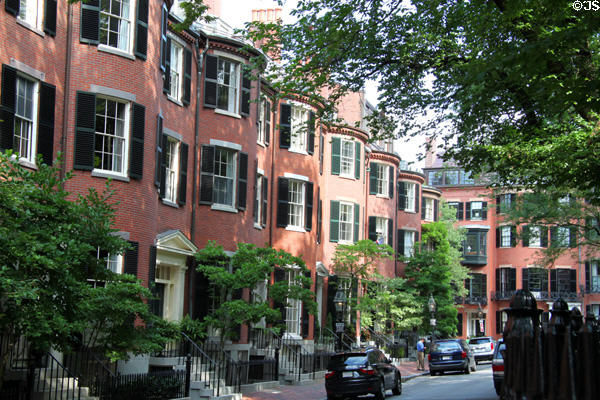 Row Houses (1835) on west side of Louisburg Square in Beacon Hill. Boston, MA.