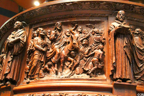 Carving of Palm Sunday procession on pulpit of Trinity Church. Boston, MA.