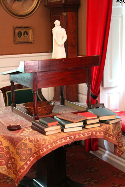 Longfellow's New England mahogany & white pine standing desk (1825-1835) with statue of Goethe at Longfellow National Historic Site. Cambridge, MA.