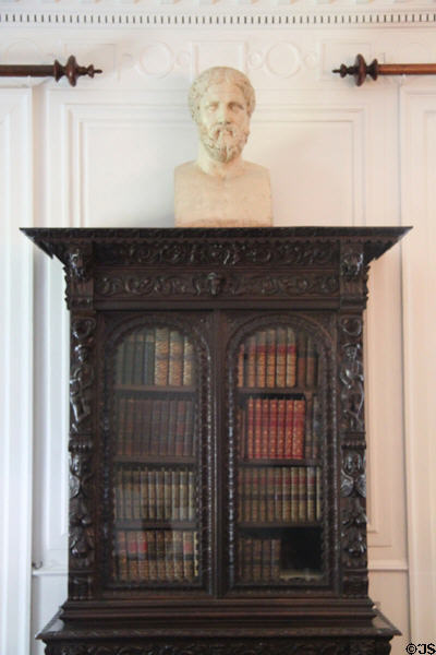 Longfellow's bookcase with bust of Plato at Longfellow National Historic Site. Cambridge, MA.