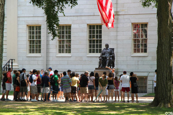 John Harvard statue in front of University Hall at Harvard University. Cambridge, MA.
