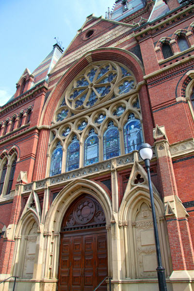 Gothic entrance & stained glass of Memorial Hall. Cambridge, MA.