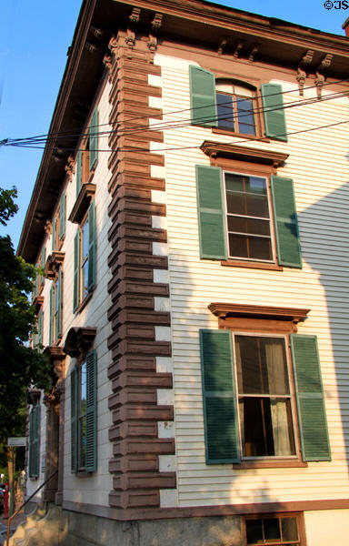 Heritage house with brown quoins on Essex St. Salem, MA.