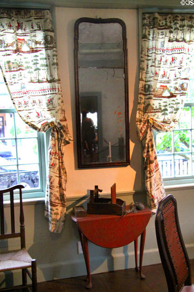Mirror & sidetable in parlor of Crowninshield-Bentley House of Peabody Essex Museum. Salem, MA.