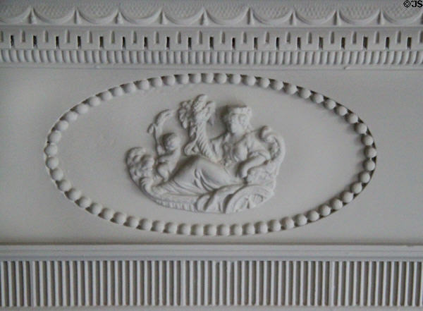 Fireplace front carved by Samuel McIntire in parlor of Peirce-Nichols House. Salem, MA.