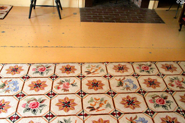 Bright colors of early American hooked rug at John Quincy Adams birthplace. Quincy, MA.