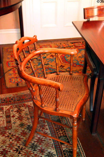 Dining room caned armchair at Peacefield. Quincy, MA.