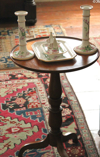 Candlesticks on small round table in guest room at Peacefield. Quincy, MA.