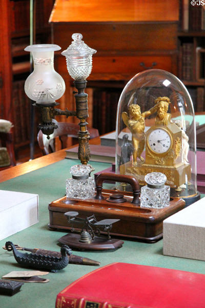 Lamp, table clock, inkwell in Stone Library at Peacefield. Quincy, MA.