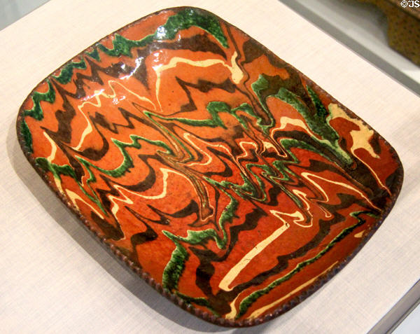Earthenware redware platter (c1850) from Pennsylvania at Museum of Fine Arts. Boston, MA.