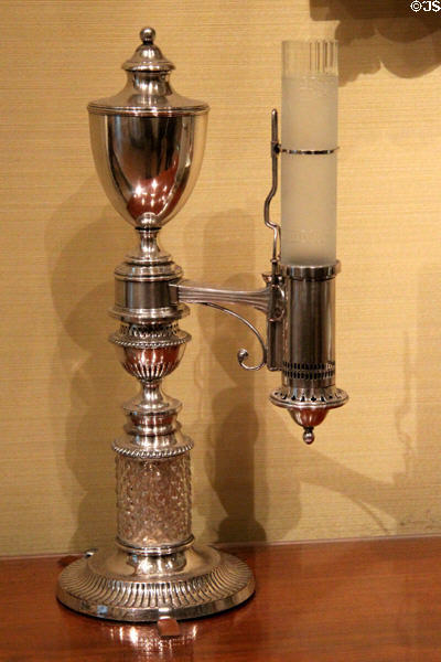 Argand lamp (c1800) from England with oil fed from urn above wick made efficient by glass chimney at Museum of Fine Arts. Boston, MA.