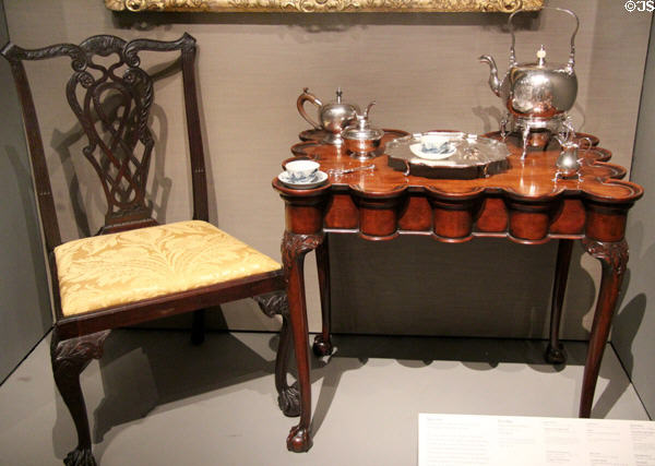 Side chair (c1765-85) & tea table (c1750-5) both from Boston, MA with silver tea service pieces at Museum of Fine Arts. Boston, MA.