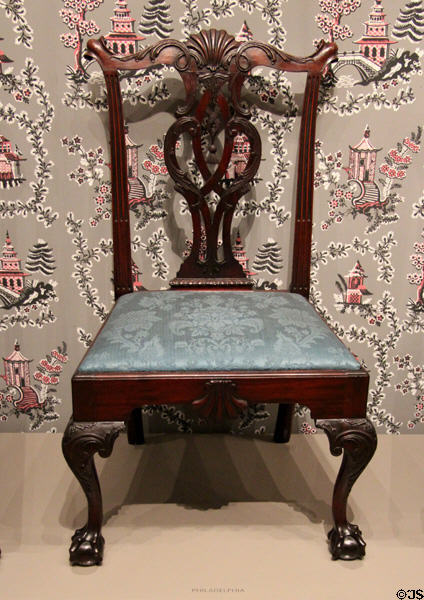 Philadelphia chair (1760-75) is taller & narrower than London chairs, elaborate carvings & squeezed ball in foot talons at Museum of Fine Arts. Boston, MA.