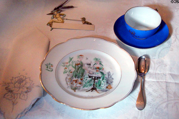 Dining room place setting with hand-painted plate (1889) at Gibson House Museum. Boston, MA.