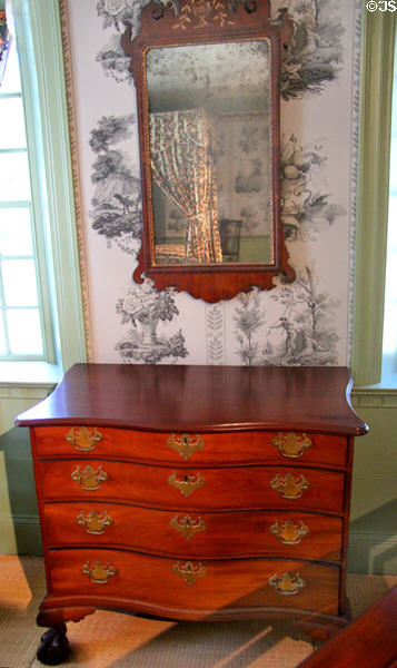 Chest of drawers (1780-99) from Boston & looking glass (1750-80) from England at Concord Museum. Concord, MA.
