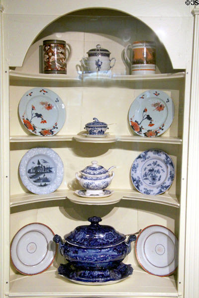Corner cabinet with collection of ceramics (18th-19thC) from England & China at Concord Museum. Concord, MA.