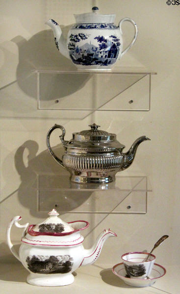 Collection of English teapots (19thC) with transfer-print, silver luster & pink luster decoration at Concord Museum. Concord, MA.