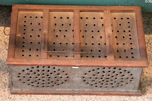Double foot warmer (early 19thC) carried coals to church at John Cabot House. Beverly, MA.