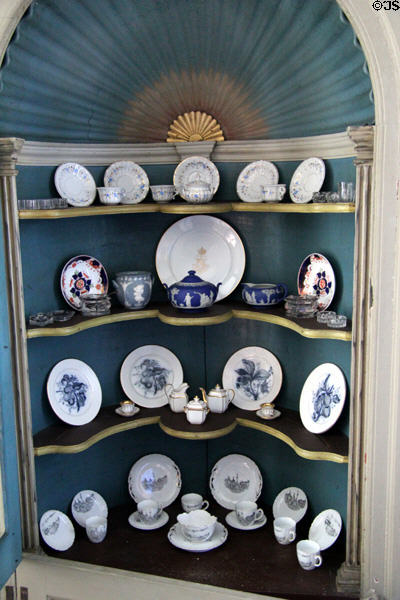 Corner hutch with collection of porcelain in dining room at Rev. John Hale House. Beverly, MA.