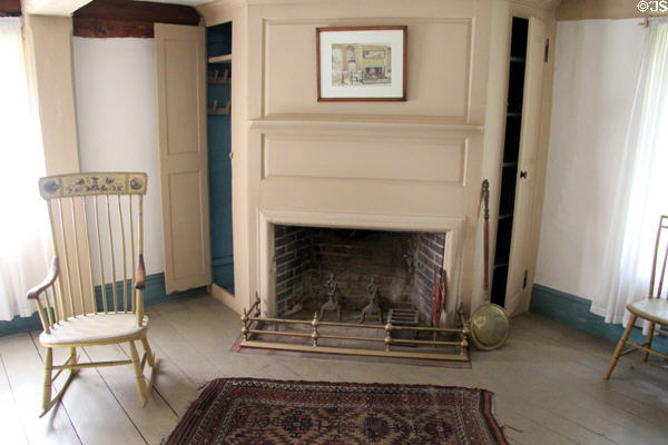 Bedroom fireplace with cupboards at Rev. John Hale House. Beverly, MA.