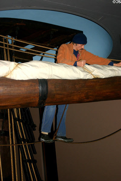 Mannequin fixing ship's rigging in Maine State Museum. Augusta, ME.