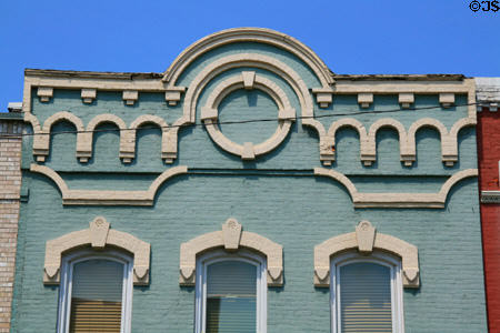 Heritage building on West Chicago Street with circle design on parapet. Coldwater, MI.
