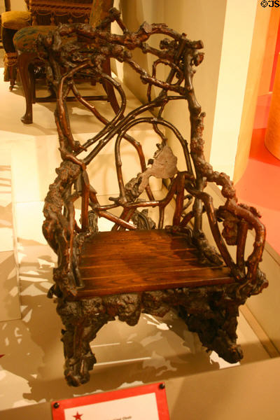 Natural vine & oak wooden rocking chair (1860-1900) used by Cornelius Vanderbilt at Henry Ford Museum. Dearborn, MI.
