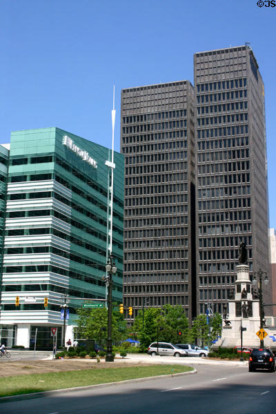 Black 1001 Woodward (1965) (23 floors) beside green One Kennedy Square. Detroit, MI. Architect: Smith, Hinchman & Grylls.