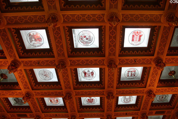 State seals on glass panels of ceiling in House chamber of Michigan State Capitol. Lansing, MI.