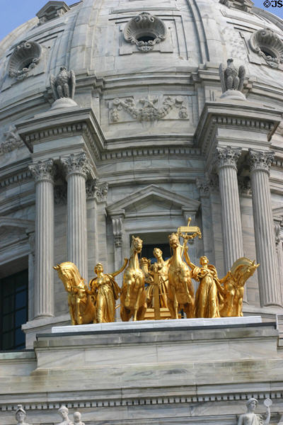 Gold Progress of the State equestrian statues on dome of Minnesota State Capitol. St. Paul, MN.