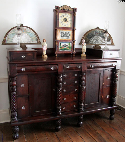 Sideboard with clock & fans at General Daniel Bissell House. St. Louis, MO.