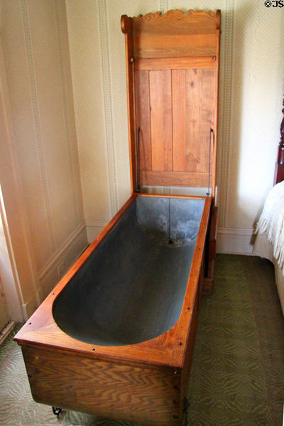 Confessional booth-style portable bathtub in open position (late Victorian) by Sears, Roebuck at Chatillon-DeMenil Mansion. St. Louis, MO.