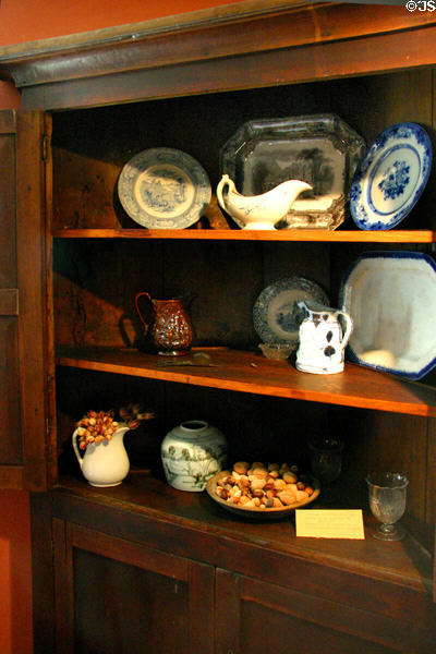 Cupboard & china in Mark Twain Boyhood Home. Hannibal, MO.
