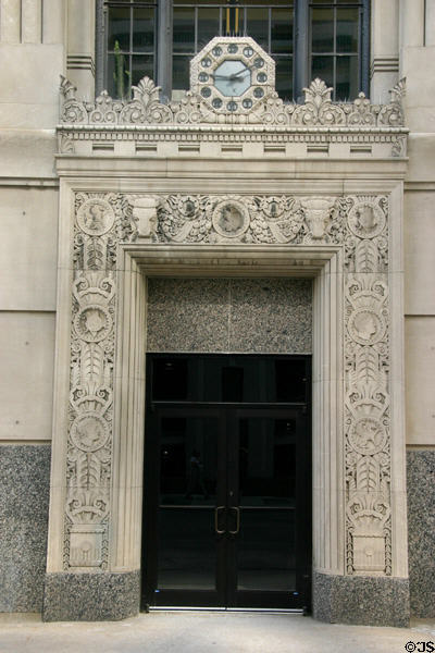 Art Deco doorway with octagonal clock of former Fidelity Bank & Trust (Old Federal Office, now 909 Walnut St.). Kansas City, MO.