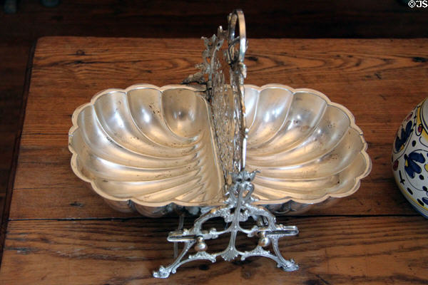 Silver plated biscuit holder with fold down serving halves at Vaile Mansion. Independence, MO.