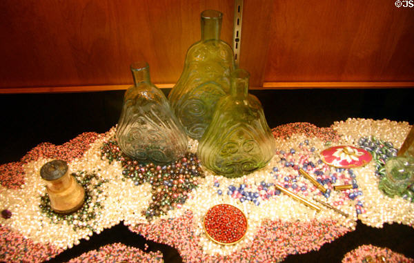 Blown-glass bottles & beads (1855) found in wreck at Steamboat Arabia Museum. Kansas City, MO.