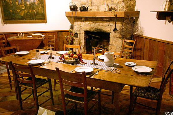 Cabin dining room furnished with cargo carried on the Arabia at Steamboat Arabia Museum. Kansas City, MO.