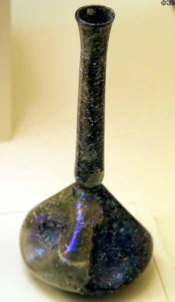 Blown yellow-glass flask (2ndC CE) from Asia Minor at University of Missouri Museum of Art & Archaeology. Columbia, MO.