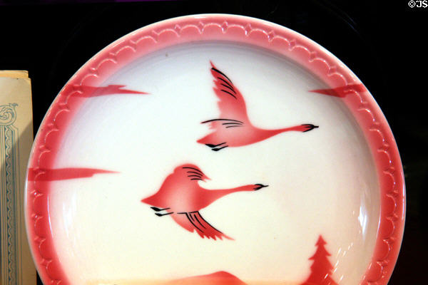 Traveler dining car china (1937-69) with flying pink birds used by Milwaukee Railroad (MILW) at Museum of the Yellowstone. West Yellowstone, MT.
