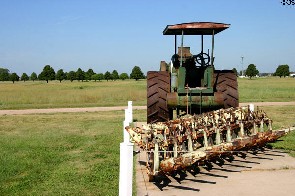 Steam tractor with plow on prairie landscape of Stuhr Museum. Grand Island, NE.