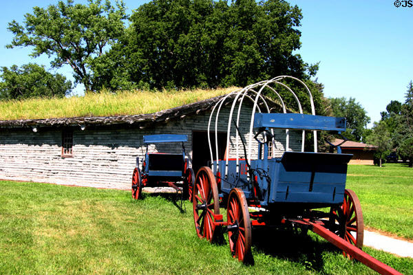 Covered wagons & sod roofed hut at Fort Kearney State Historical Park. Kearney, NE.