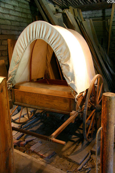 Mormon handcart at Fort Kearney used by settlers organized by the church to walk from Iowa City to Salt Lake City (1,300 miles in 125 days) who were allowed 17 lbs/adult + 10 lbs/child. Kearney, NE.