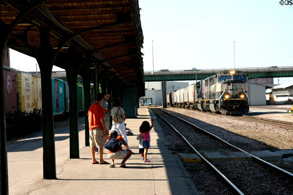 Watching freight trains pass through Lincoln Station. Lincoln, NE.
