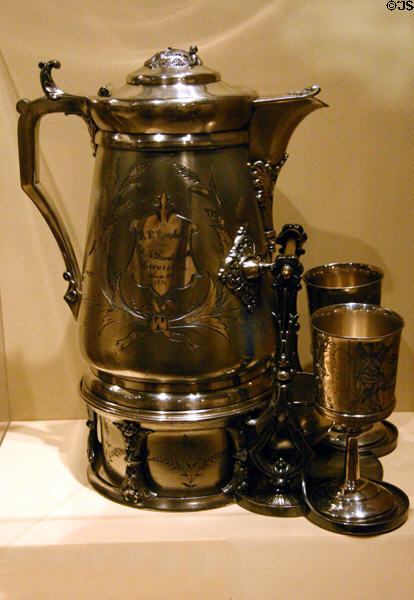 Silver water service (1876) presented to Burlington railroad land agent in Museum of Nebraska History. Lincoln, NE.