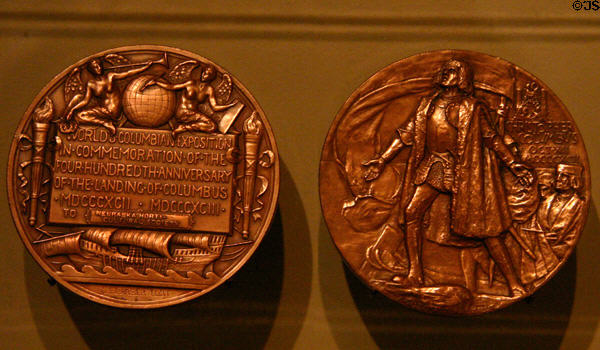 World Columbian Exposition, Christopher Columbus copper medal (1893) with Columbus by Augustus Saint-Gaudens & reverse by Charles E Barber because Saint-Gaudens design was controversial at Museum of Nebraska History. Lincoln, NE.