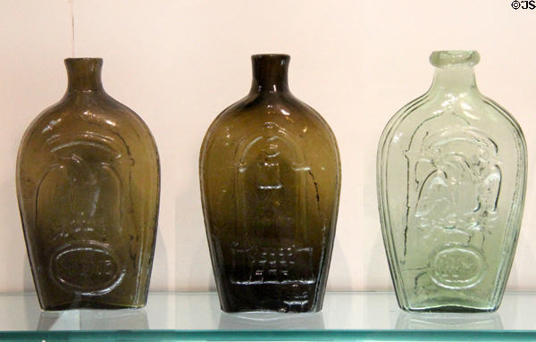 Three glass pint flasks (c1825 & 40) by Keene Glass Works of Keene, NH at Currier Museum of Art. Manchester, NH.