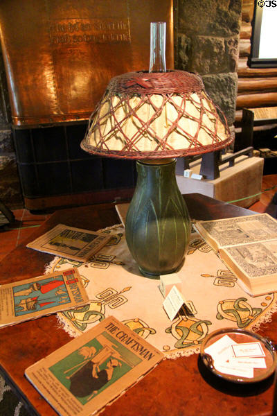 Octagonal table set with Arts & Crafts objects at Stickley Museum at Craftsman Farms. Morris Plains, NJ.